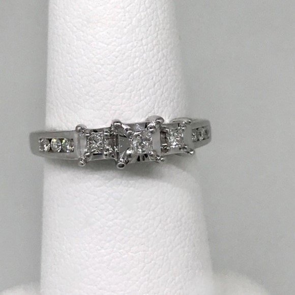 Jewelry - 14 kt WG ring .33 ctw princess & round diamonds